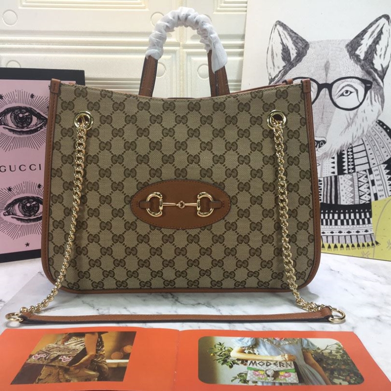 G*u*i shopping bags